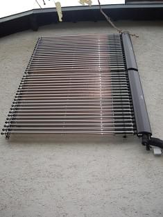 Tubes solaire en façade et relève chaudière fioul Tubes solaire en façade et relève chaudière fioul